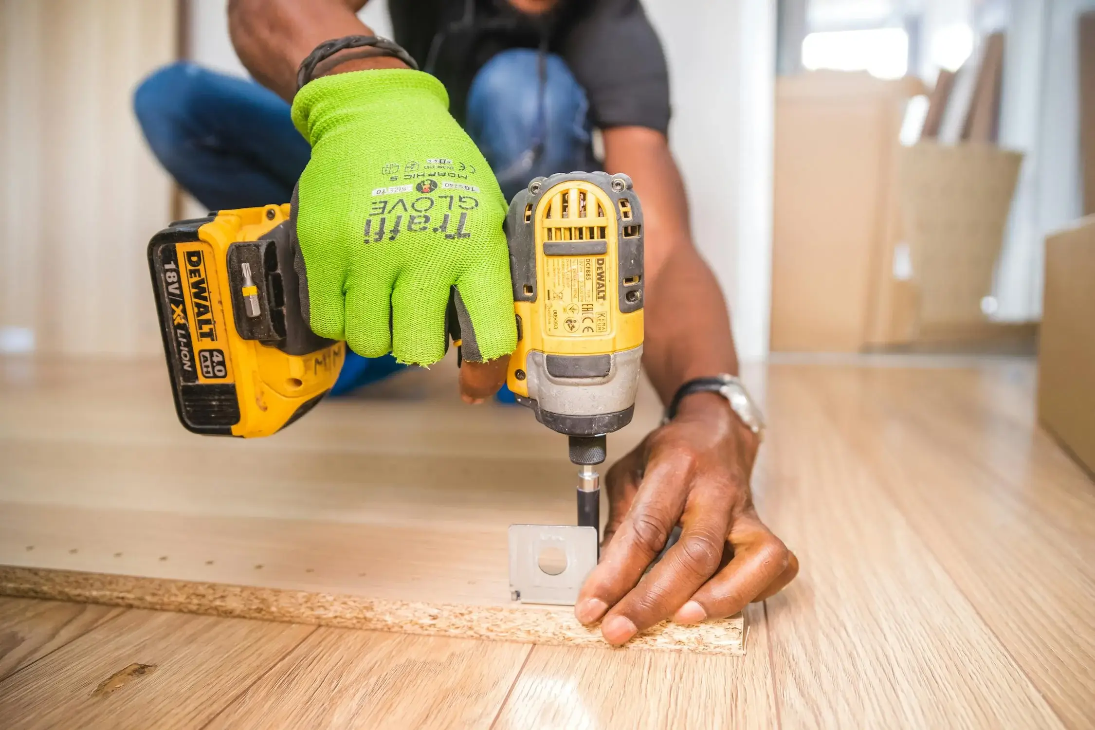 A worker using a screwdriver